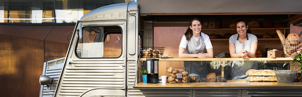 Two women are in a food truck; image used for HSBC Singapore Bank Loans